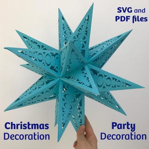 Könnte beinhalten: Ein leuchtend türkisfarbener Papierstern mit komplizierten Ausschnittmustern an jeder seiner vielen Spitzen. Der Text SVG and PDF files, Christmas Decoration und Party Decoration ist sichtbar. Der Stern hat eine dreidimensionale geometrische Form.