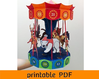 May include: A colorful paper carousel advent calendar with a blue base and a red, orange, and yellow roof. The carousel features a polar bear, a reindeer, a dog, a cat, and a horse. The numbers 13, 21, 10, 14, 19, and 12 are visible on the carousel.
