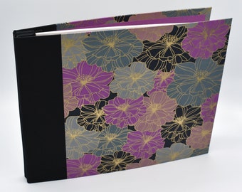 Handmade expandable scrapbook with purple and blue flowers