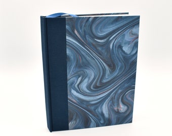 Handmade lined journal with blue swirl marbled cover