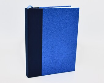 Handmade bullet journal with blue glitter cover