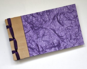 Handmade photo album with translucent purple rice paper cover