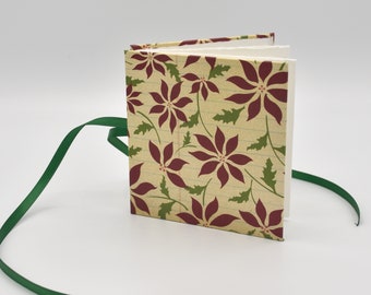 Handmade mini accordion album with poinsettias