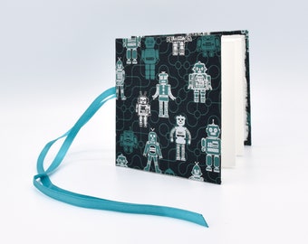 Handmade mini accordion album with teal and silver robots