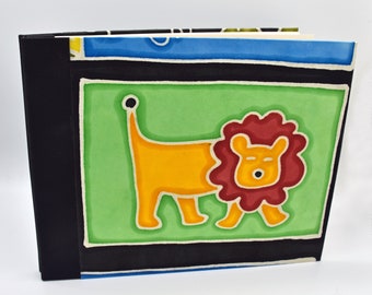 Handmade expandable scrapbook with jungle theme cover