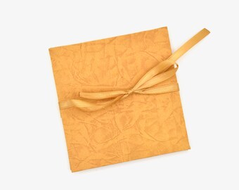 Handmade mini accordion album with textured faux leather look paper