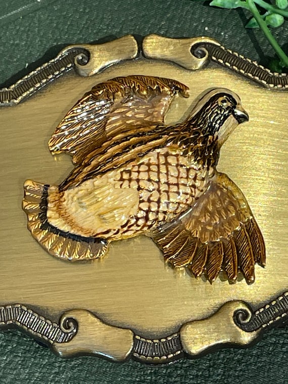 1977 Raintree belt buckle