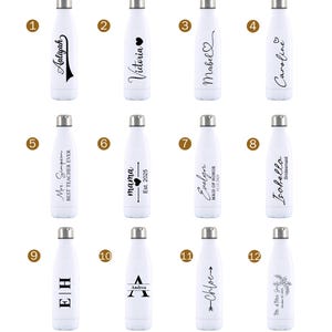 May include: A collection of white insulated water bottles with silver lids. Each bottle features a different design, including names like "Aaliyah," "Victoria," and "Mabel," along with other text and graphics. The bottles are designed for personalization.