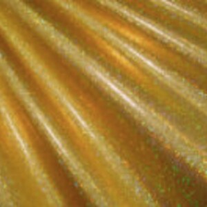 May include: Gold iridescent fabric with a subtle shimmer. The fabric has a smooth, silky texture.
