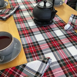 Tartan Table Runner and 6-8-12 Napkins. Dress Stewart Tartan. Poly- viscose fabric. Can be customised. Different number of napkins available