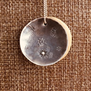 Solar Eclipse Pendant Necklace: Oxidized Sterling Silver Moon, Brass Sun
