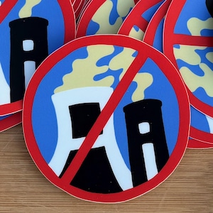 May include: A set of three ceramic mugs with a speckled, matte finish. The mugs are in shades of cream, light gray, and dark gray. Each mug has a simple, minimalist design and a rounded handle.