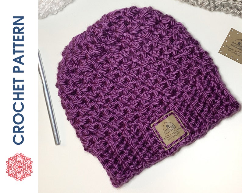 Chunky crochet beanie made with the beautiful grit stitch and super bulky yarn for a warm, textured finish. Shown in neutral tones for a modern, unisex style. Quick and easy PDF crochet pattern ideal for beginners and experienced makers. Cozy winter hat perfect for markets, gifts, or everyday wear. Handmade look and feel make this super bulky ear-hugging beanie a timeless cold-weather accessory.