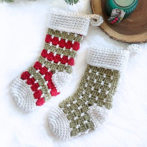 Chunky crochet Christmas stocking made with super bulky yarn for a cozy farmhouse holiday look. Features thick textured stitches and a wide hanging loop for easy display on mantels or stair rails. Shown in neutral tones for rustic, modern Christmas decor. Quick and easy PDF crochet pattern perfect for beginners and experienced makers. A timeless handmade stocking for festive home décor or thoughtful holiday gifting.