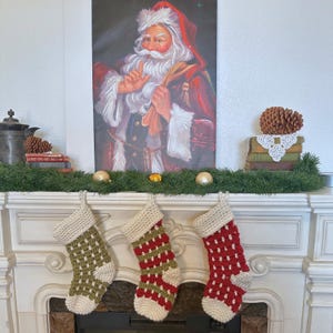 Chunky crochet Christmas stocking made with super bulky yarn for a cozy farmhouse holiday look. Features thick textured stitches and a wide hanging loop for easy display on mantels or stair rails. Shown in neutral tones for rustic, modern Christmas decor. Quick and easy PDF crochet pattern perfect for beginners and experienced makers. A timeless handmade stocking for festive home décor or thoughtful holiday gifting.