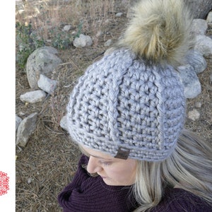Quick and cozy crochet ribbed beanie made with super bulky yarn for maximum warmth and softness. Beginner-friendly PDF crochet pattern that works up in about an hour. Features stretchy ribbed texture and classic folded brim for a snug, stylish fit. Shown in neutral tones for a timeless winter look. Perfect handmade hat for markets, gifts, or relaxing weekend projects that deliver instant satisfaction.