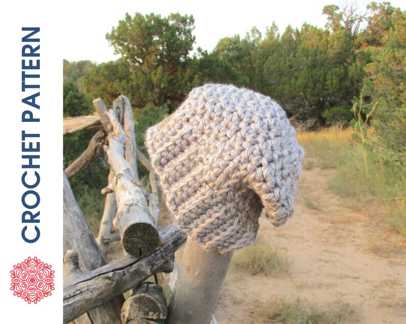 Chunky crochet beanie made with the beautiful grit stitch and super bulky yarn for a warm, textured finish. Shown in neutral tones for a modern, unisex style. Quick and easy PDF crochet pattern ideal for beginners and experienced makers. Cozy winter hat perfect for markets, gifts, or everyday wear. Handmade look and feel make this super bulky ear-hugging beanie a timeless cold-weather accessory.