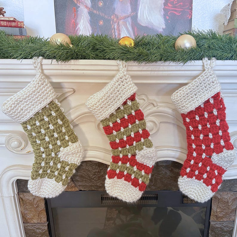 Chunky crochet Christmas stocking made with super bulky yarn for a cozy farmhouse holiday look. Features thick textured stitches and a wide hanging loop for easy display on mantels or stair rails. Shown in neutral tones for rustic, modern Christmas decor. Quick and easy PDF crochet pattern perfect for beginners and experienced makers. A timeless handmade stocking for festive home décor or thoughtful holiday gifting.