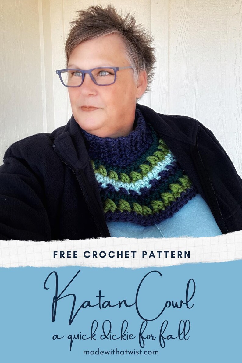 May include: Free crochet pattern for a Katan Cowl, a quick neck warmer for fall. The cowl is crocheted in shades of blue, green, and white. The text "madewiththatwist.com" is at the bottom of the image.