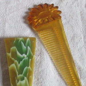 antique art deco pocket comb celluloid sunflower