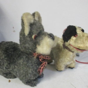 TWO vintage mechanical battery operated stuffed dogs for dolls