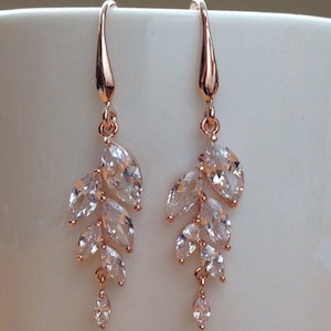 Stunning rose gold plated crystal bunched dangle earrings