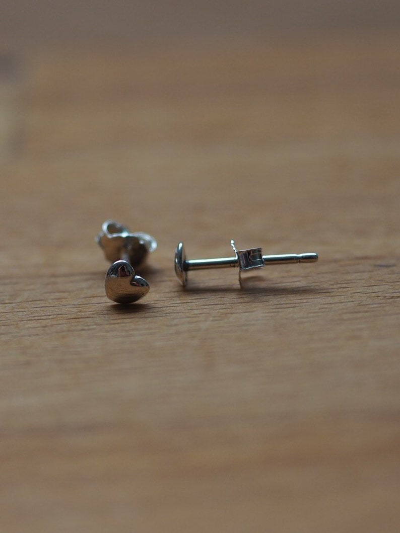 Minimalist silver or rose gold heart stud earrings
