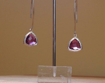 Purple faceted glass on long silver rhodium plated ear wires