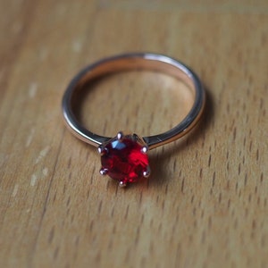 Rose gold plated Red zircon in tall 6-claw ring image 1