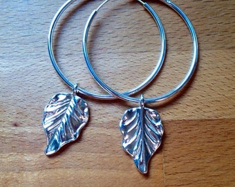 Glossy silver leaf hoop earrings