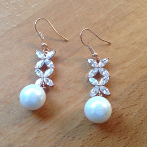 Rose gold plated floral crystaland pearl earrings image 1