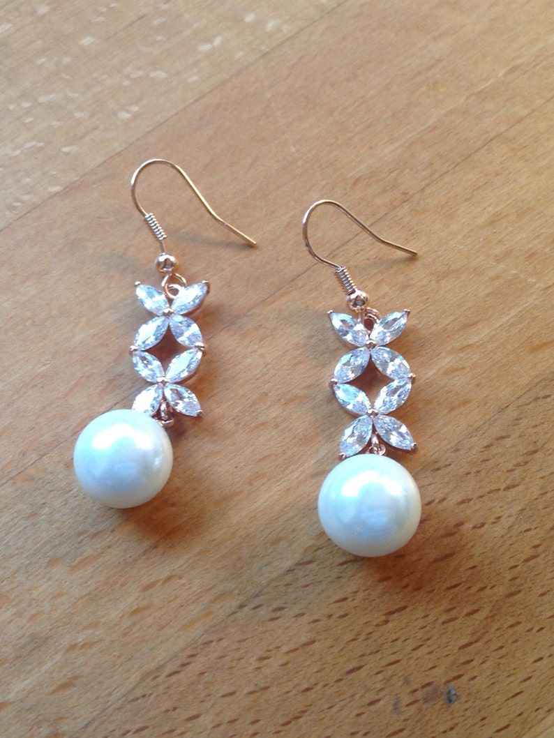 Rose gold plated floral crystaland pearl earrings image 1