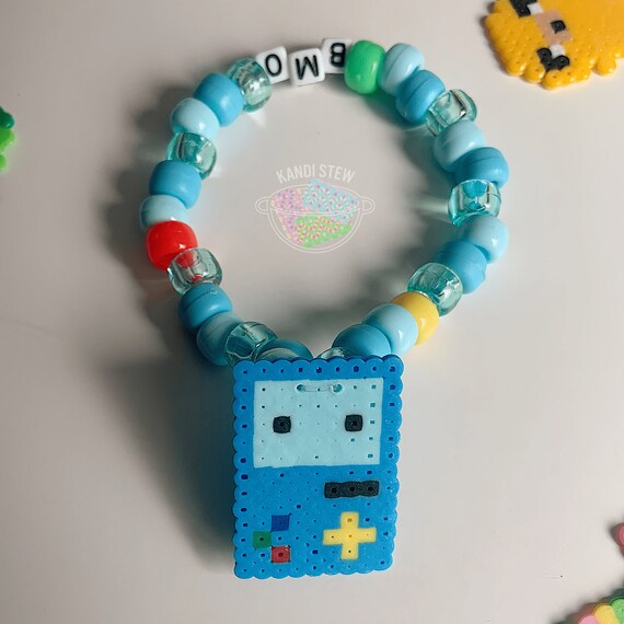 Alien perler bracelet #kidcore #love #cute #neon... - Depop