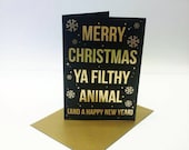 Set of 5 Christmas cards inspired by the movie Home Alone 2, available in silver and gold foil