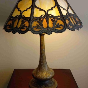 Antique all original Bradley Hubbard Art Nouveau 26 inches bronze 8 panels slag glass table lamp signed circa 1900s