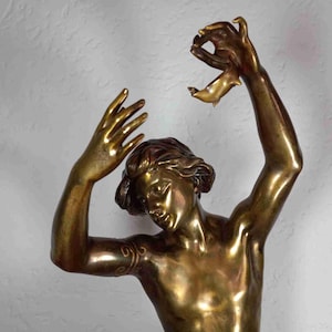 Antique 27 in French gilt bronze sculpture of allegorical semi-nude man with oil lamp by Luca Madrassi Paris circa 1880
