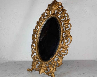 Antique Victorian elaborated gilt bronzed iron art table framed oval mirror picture circa 1880s