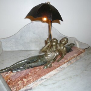 Rare French Art Deco spelter woman and man umbrella figural image 5