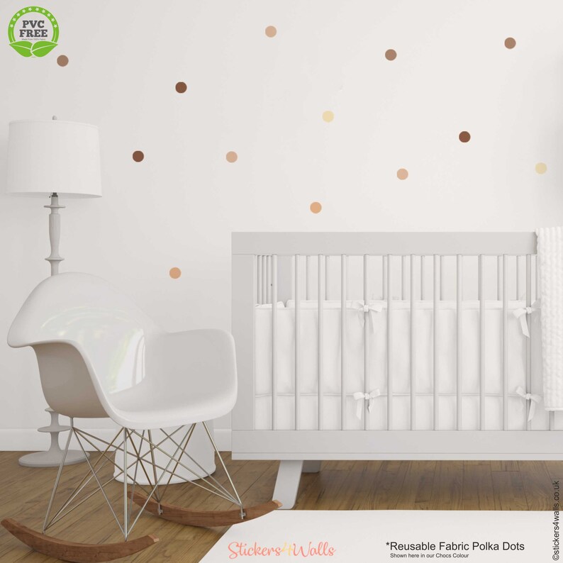 Reusable polka dot wall decals for nursery decor, with pastel brown, peach, and yellow dots