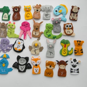 May include: A set of 26 felt finger puppets, each featuring a different animal and letter of the alphabet. The puppets are colorful and have embroidered details.
