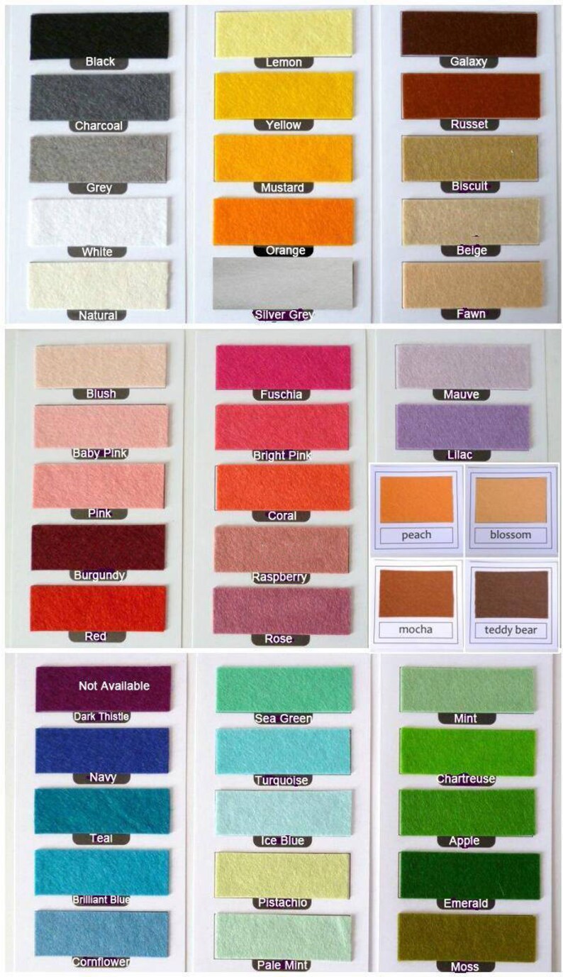 May include: A colour chart with 48 felt swatches, each labelled with a colour name. The colours are arranged in columns, with each column representing a different colour family. The colour families include black, grey, white, natural, blush, baby pink, pink, burgundy, red, not available, dark thistle, navy, teal, brilliant blue, cornflower, lemon, yellow, mustard, orange, silver grey, fuschia, bright pink, coral, raspberry, rose, sea green, turquoise, ice blue, pistachio, pale mint, galaxy, russet, biscuit, beige, fawn, mauve, lilac, peach, blossom, mocha, teddy bear, mint, chartreuse, apple, emerald, and moss.