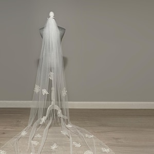Luxury couture cathedral lace veil with scattered leaves beaded edge veil
