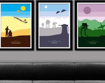 May include: Three framed Star Wars posters with minimalist designs depicting scenes from the movies. The posters are titled "Tatooine", "Hoth", and "Endor" and feature iconic characters and vehicles from the films.