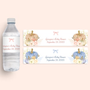 May include: A clear water bottle with a label featuring a pink bow and the text "Georgina's Baby Shower September 10, 2020." Two banner designs with pumpkin illustrations and text for a baby shower. One banner has a pink bow and the other has a blue bow.
