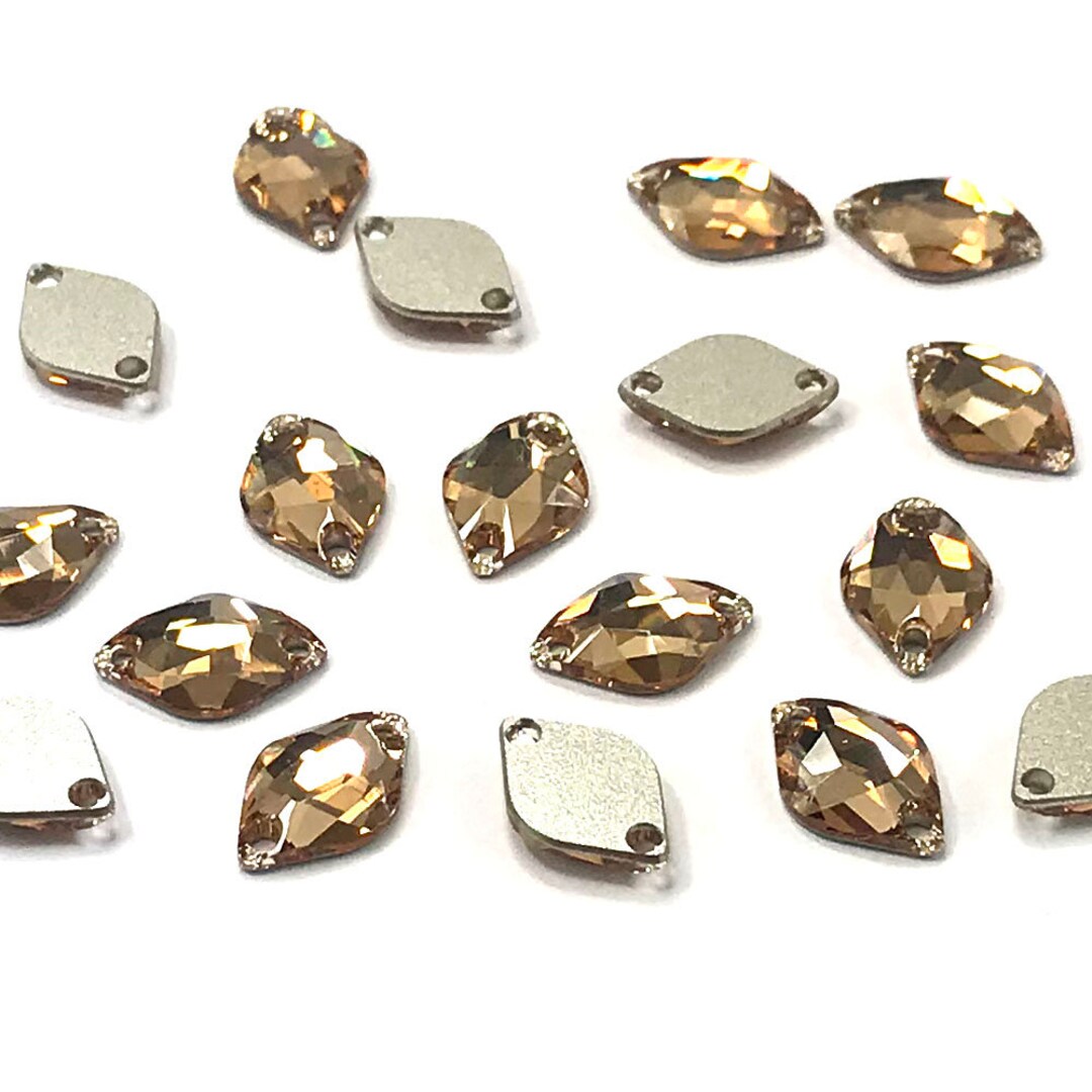Light Colorado Topaz 246 Swarovski 3211 Lemon Shaped 14x9mm Light Colorado Topaz 246 Swarovski 3211 Lemon Shaped 14x9mm