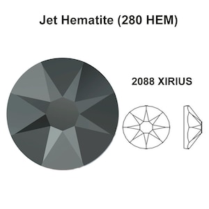 May include: A dark grey, faceted, round crystal rhinestone with a star-shaped design. The crystal is labelled "Jet Hematite (280 HEM)" and "2088 XIRIUS".