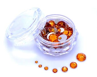 144 pcs - Orange foncé (1202) Décoration pour ongles en cristal Swarovski 2058/2088 à dos plat, tailles variées assorties 2 mm-6 mm *Pas de tarifs vers les États-Unis *Avec étui de rangement