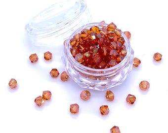 Cristal de cuivre (001 COP) véritable Swarovski 5328 XILION perles toupies pour la fabrication de bijoux * Toutes les tailles * Aucun tarif vers les États-Unis * Avec étui de rangement
