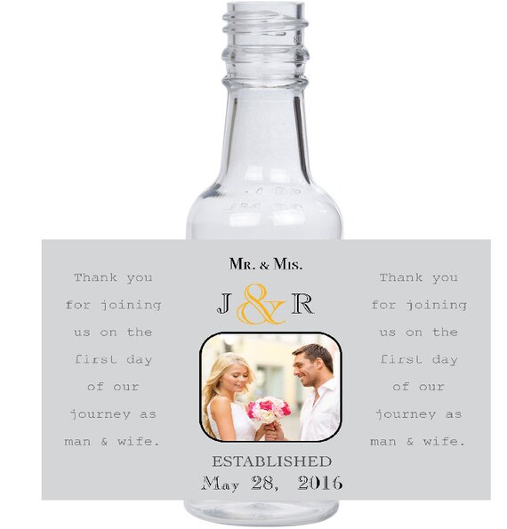 12 personalized Mr. & Mrs. Smith mini liquor bottles, caps, and labels for your wedding, engagement, or event party