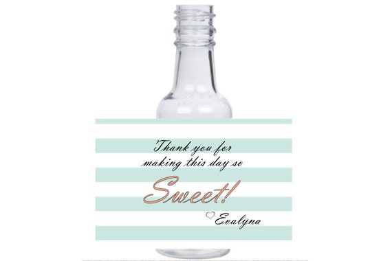 12 personalized welcome baby mini liquor bottles, caps, and labels for your event